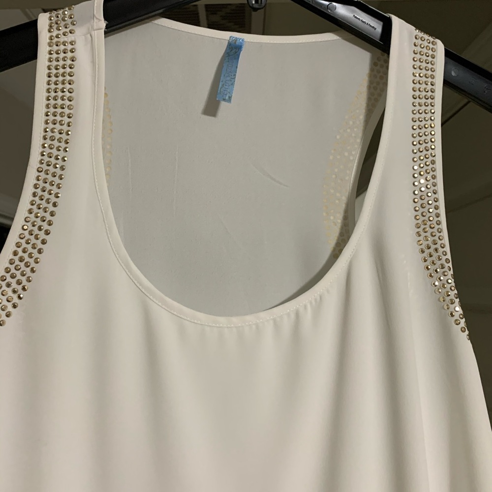 White top with gold detailing